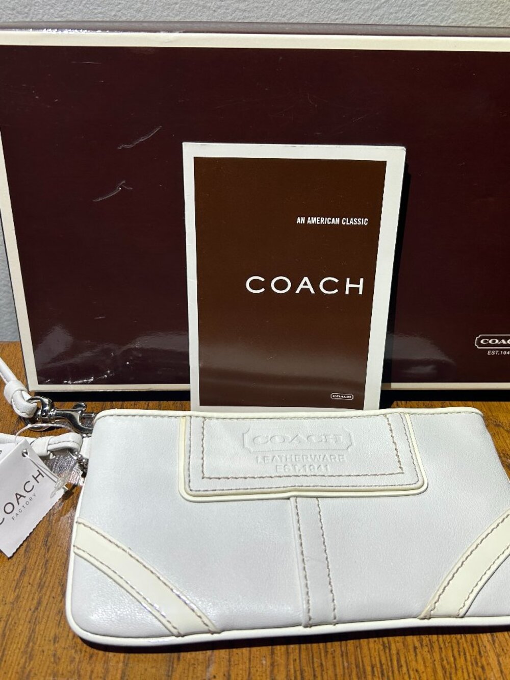 Vintage white leather Coach wristlet